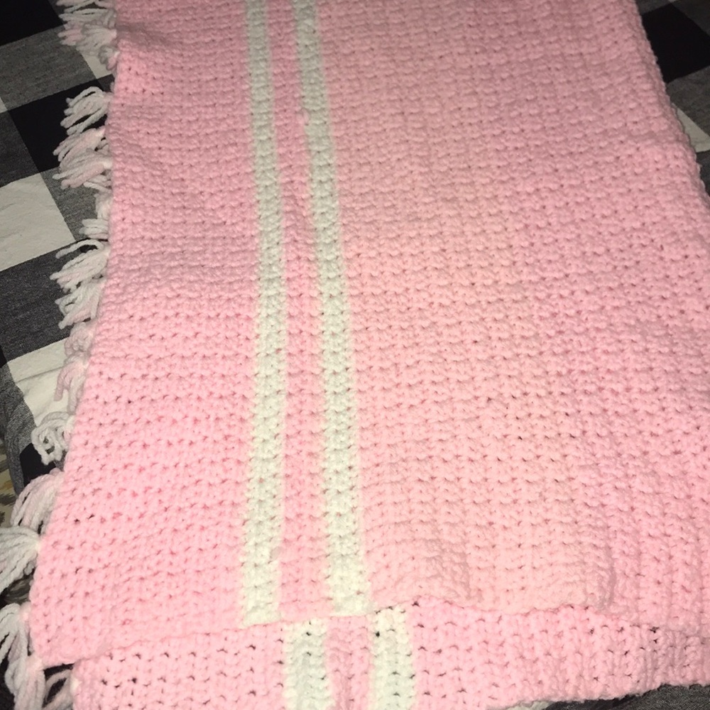 Lightly used baby girl crochet blanket